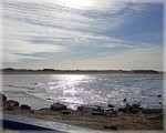 Desembocadura de la albufera con sol reflejado en el agua